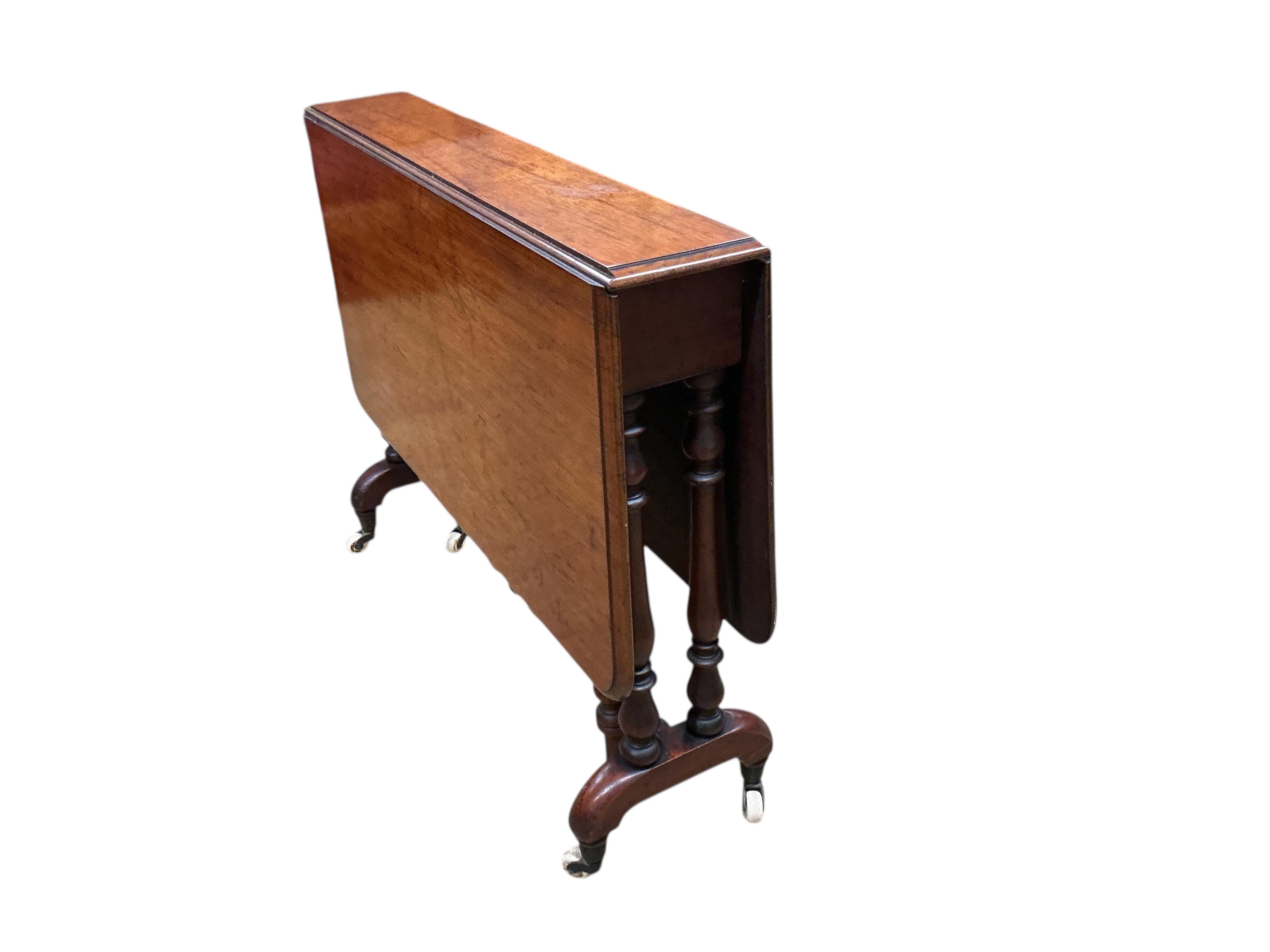 A Victorian mahogany Sutherland table, width 90cm, depth 26cm, height 73cm